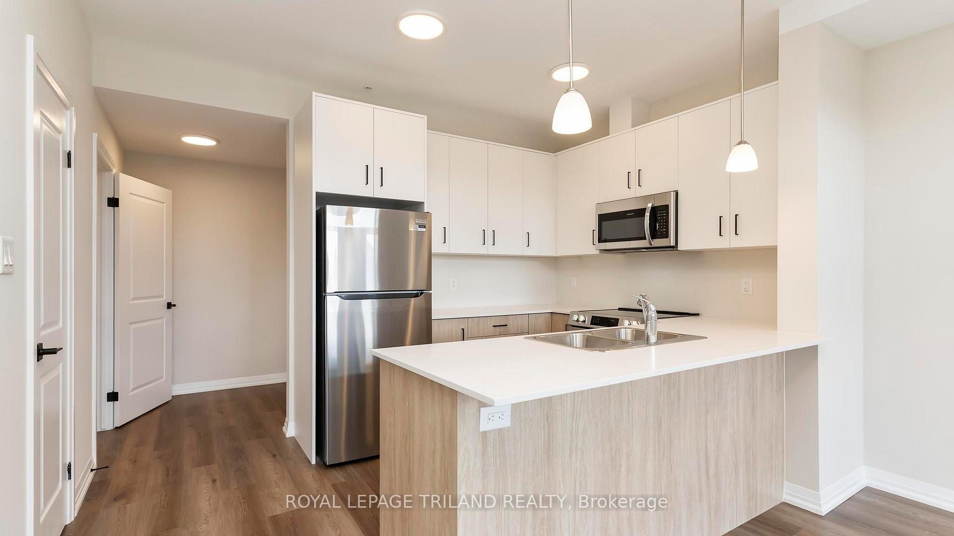 Photo 8 of Unit 101, 865 Kleinburg Drive, London, North B — HOMEH