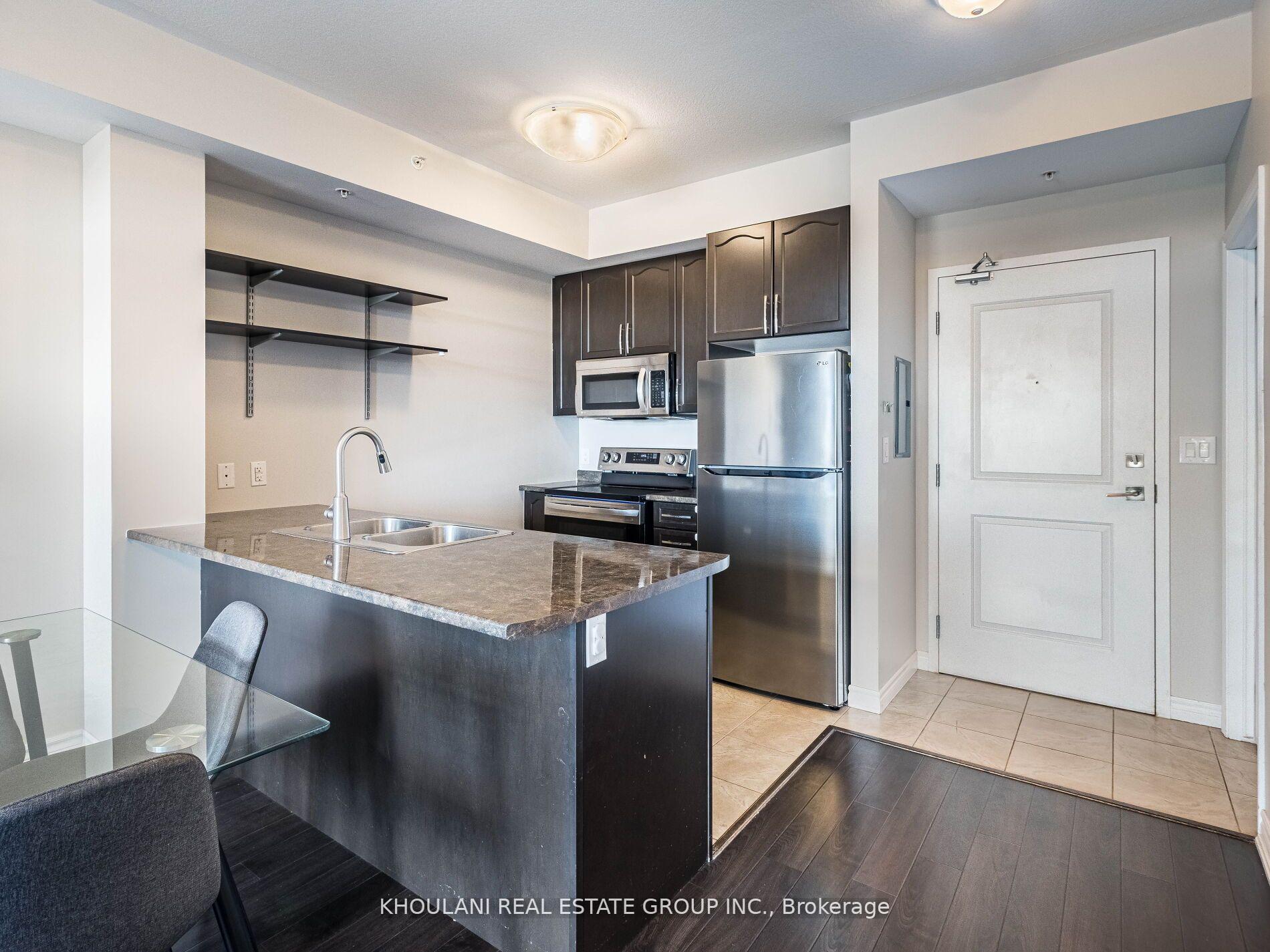 Photo 3 of Unit 318, 5020 Corporate Drive, Burlington, Uptown — HOMEH