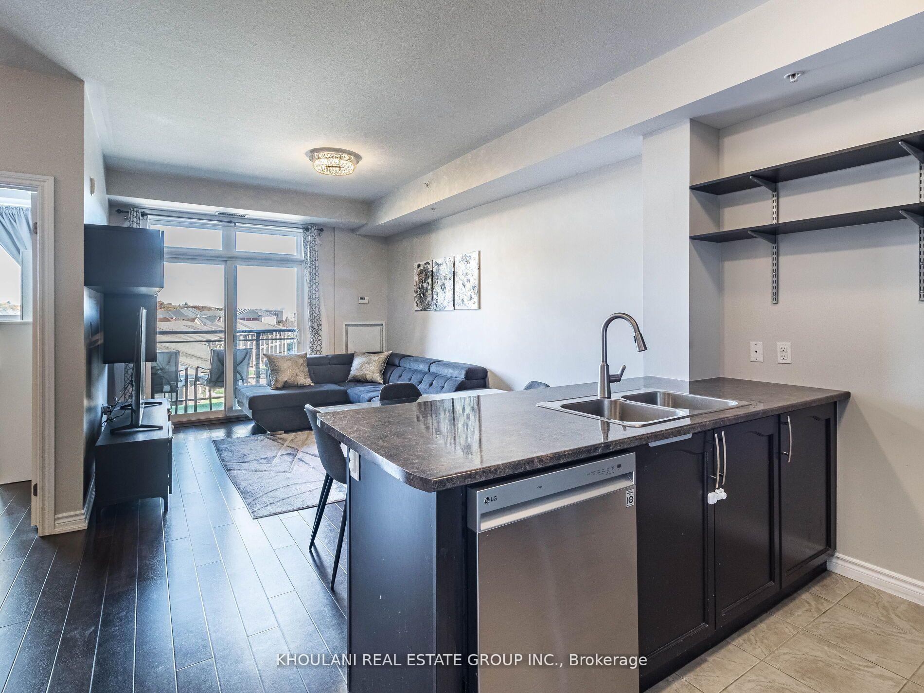 Photo 4 of Unit 318, 5020 Corporate Drive, Burlington, Uptown — HOMEH