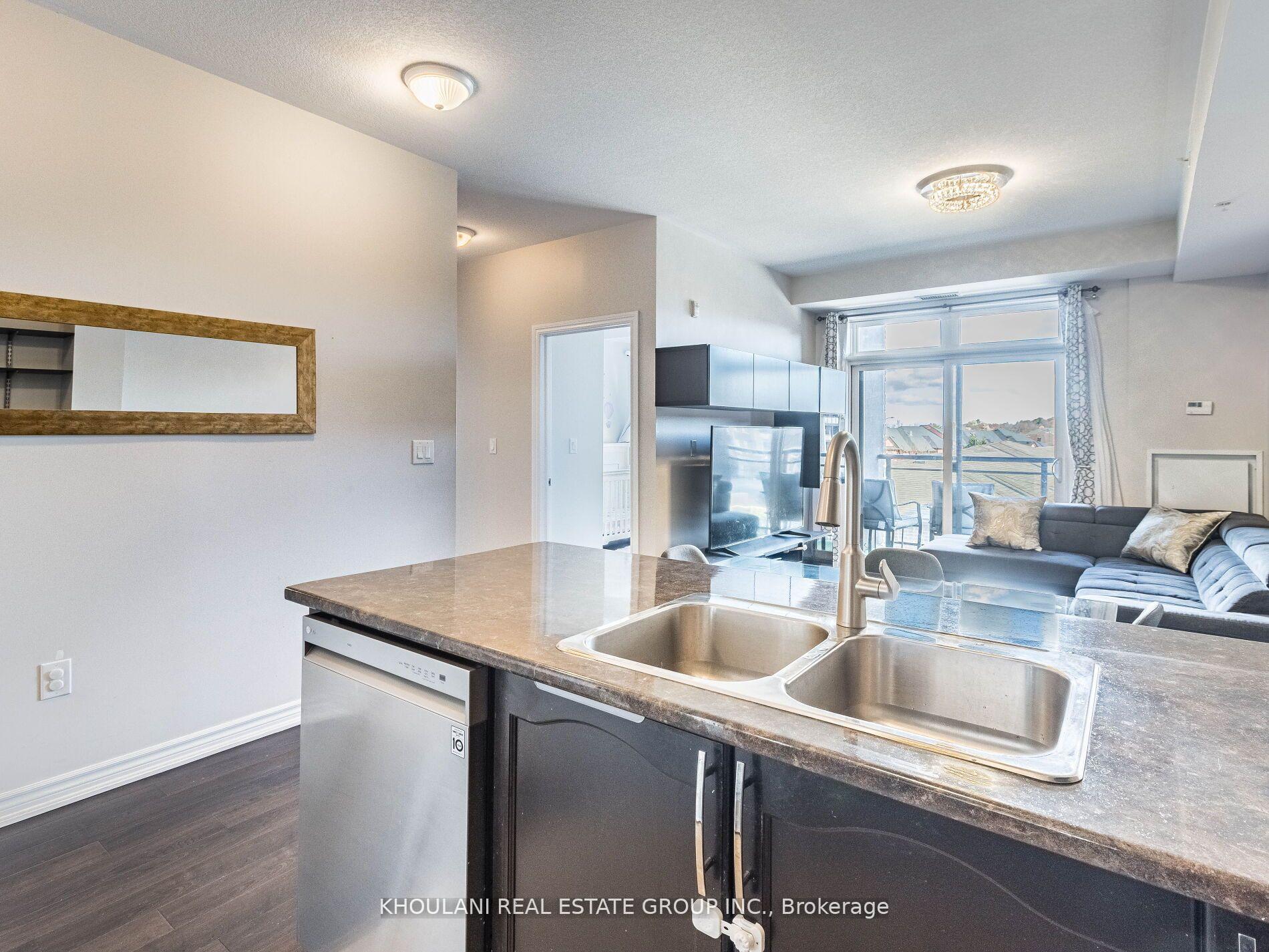 Photo 5 of Unit 318, 5020 Corporate Drive, Burlington, Uptown — HOMEH
