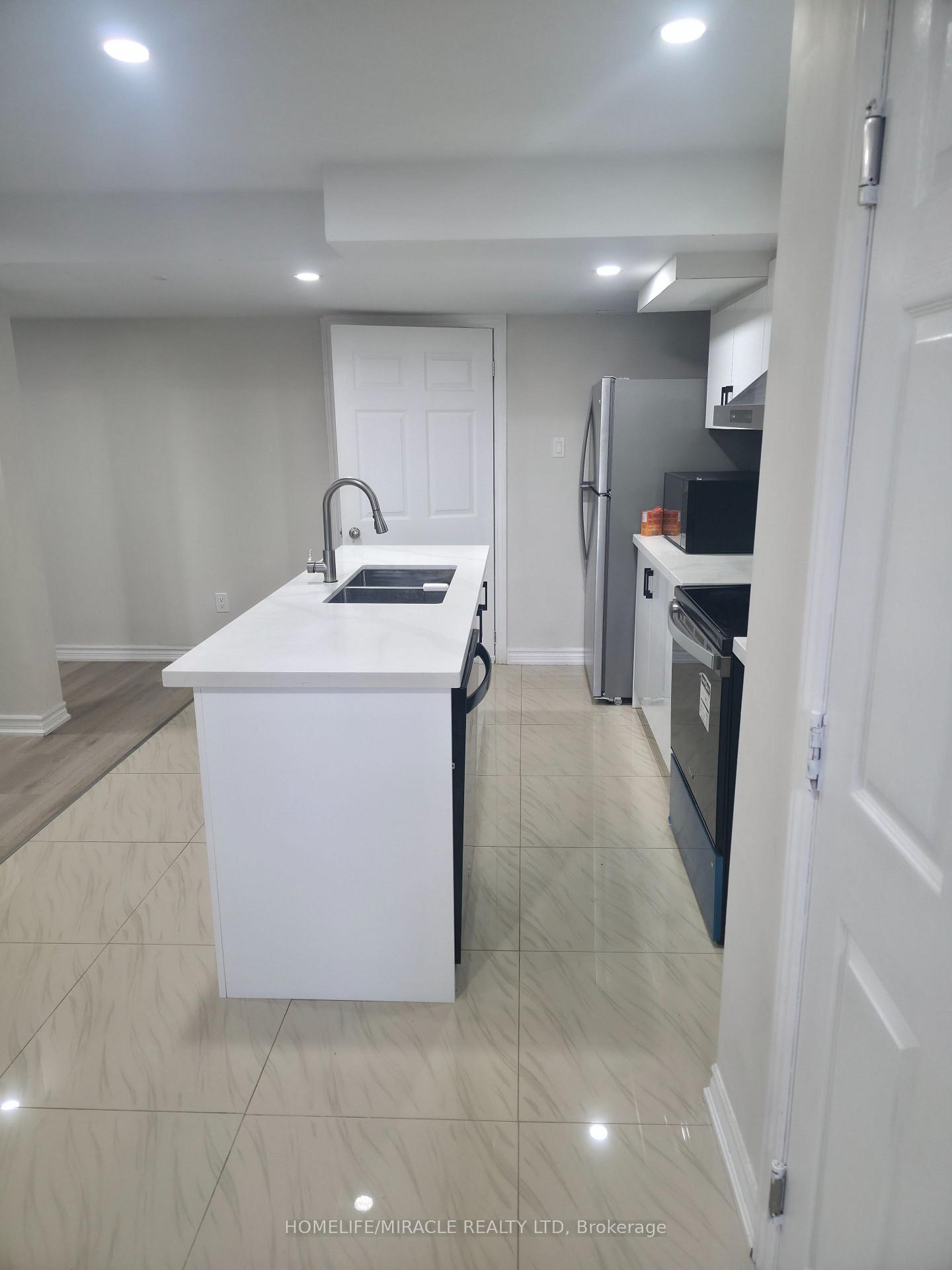 Photo 5 of Unit BSMT, 1022 Glenbourne Drive, Oshawa, Pinecrest — HOMEH