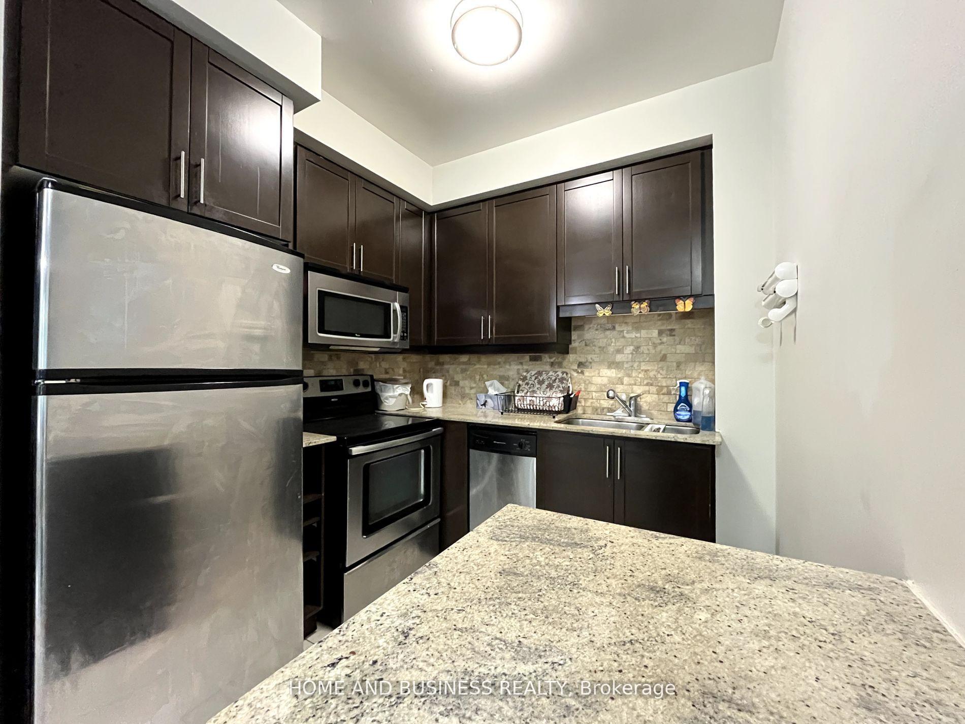 Photo 6 of Unit 101, 80 Absolute Avenue, Mississauga, City Centre — HOMEH