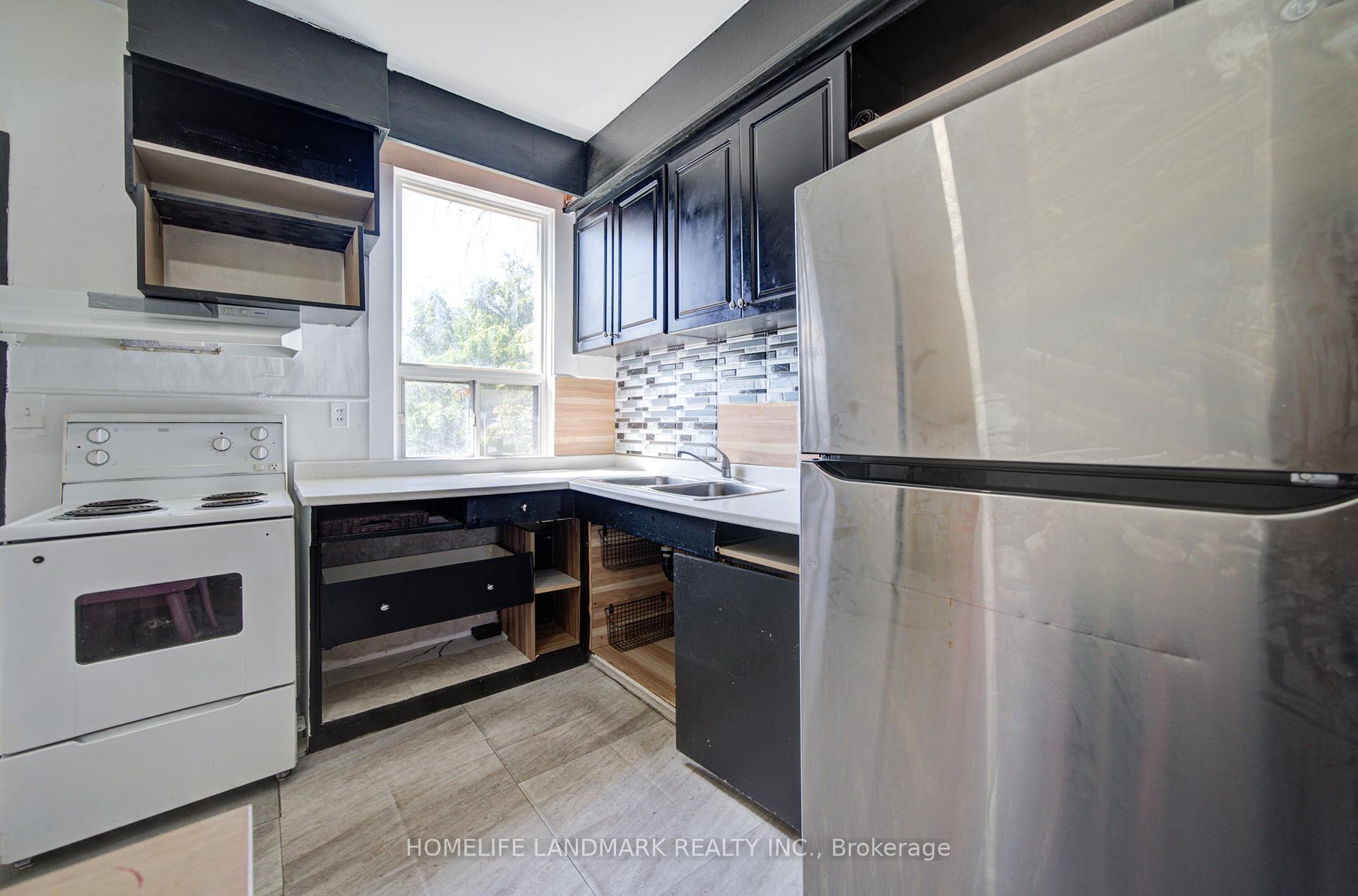Photo 12 of Unit Main & BSMT, 19 Armstrong Avenue, Toronto, Dovercourt-Wallace Emerson-Junction — HOMEH