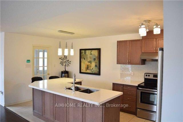 Photo 2 of 1075 Bur Oak Avenue, Markham, Wismer — HOMEH