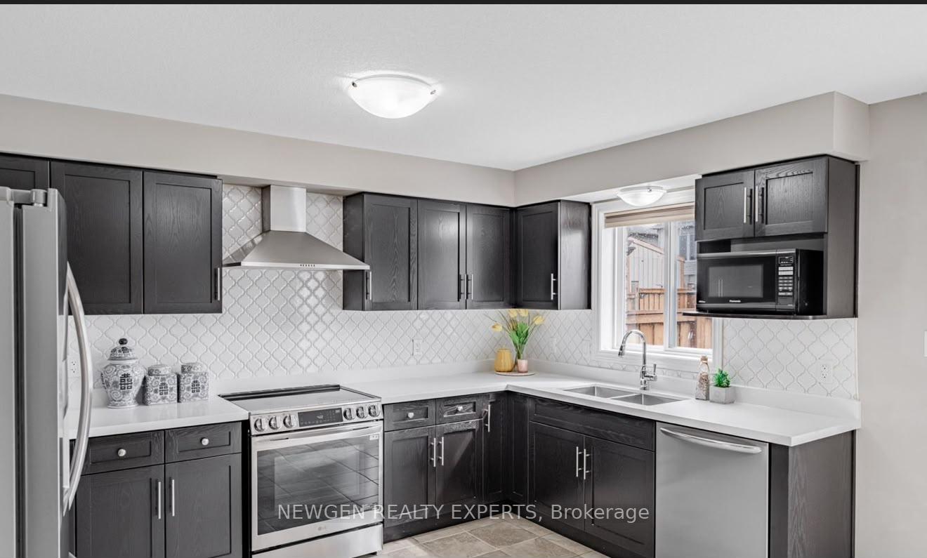 Photo 13 of 111 John Brabson Crescent, Guelph, Kortright East — HOMEH