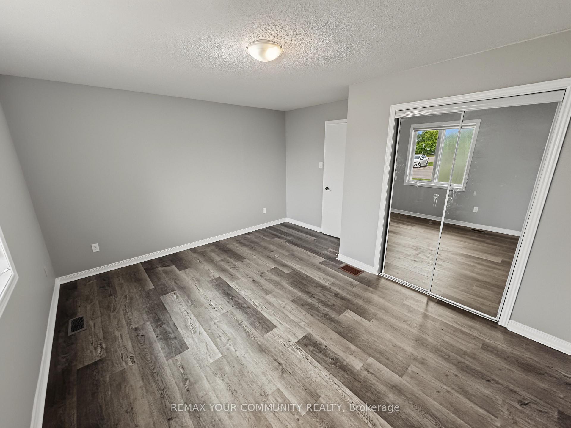 Photo 3 of Unit 101, 10 Riverside Drive, Kawartha Lakes, Bobcaygeon — HOMEH