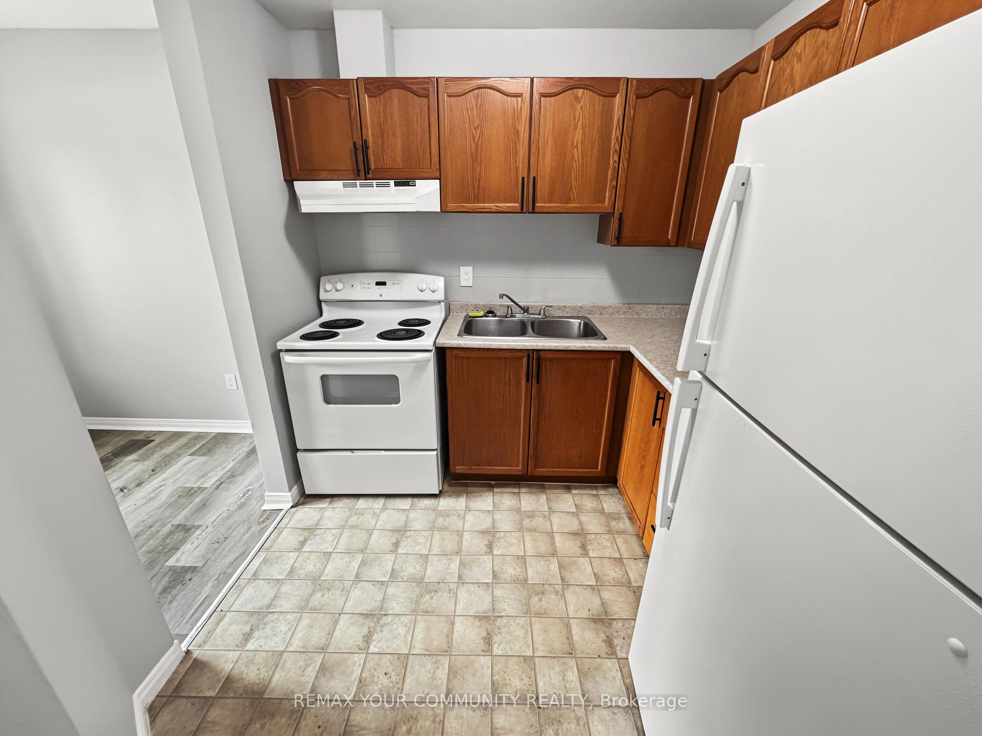 Photo 9 of Unit 101, 10 Riverside Drive, Kawartha Lakes, Bobcaygeon — HOMEH