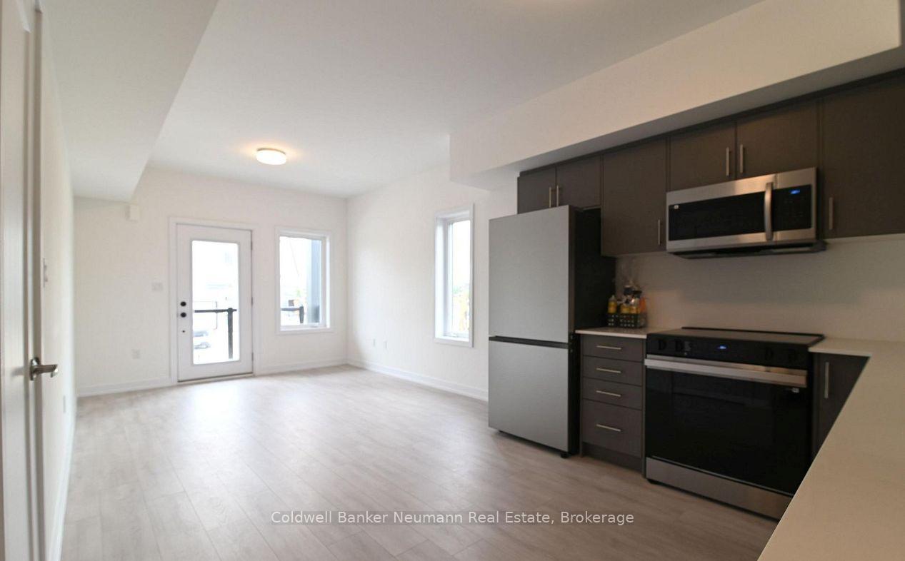 Photo 2 of Unit 12, 42 Lowes Road W, Guelph, Clairfields/Hanlon Business Park — HOMEH