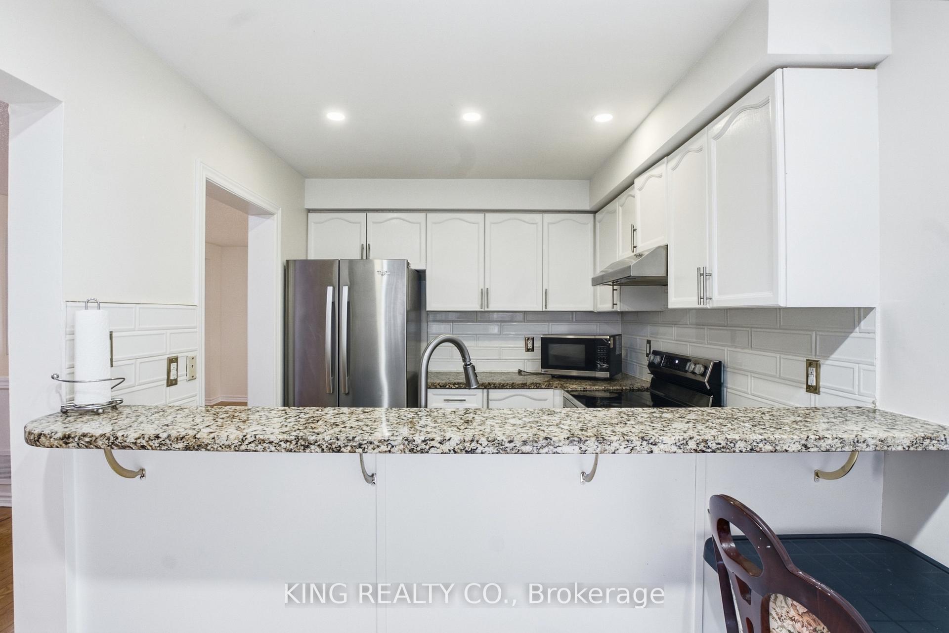 Photo 8 of 81 Tessler Crescent, Brampton, Brampton West — HOMEH