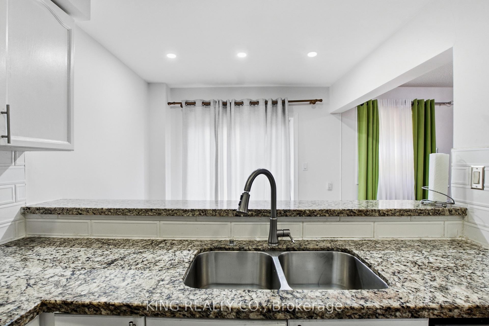Photo 9 of 81 Tessler Crescent, Brampton, Brampton West — HOMEH