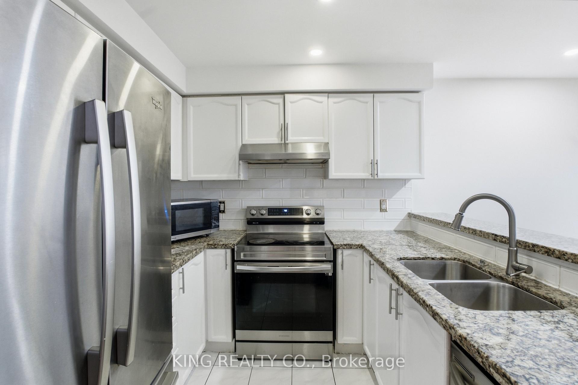 Photo 10 of 81 Tessler Crescent, Brampton, Brampton West — HOMEH