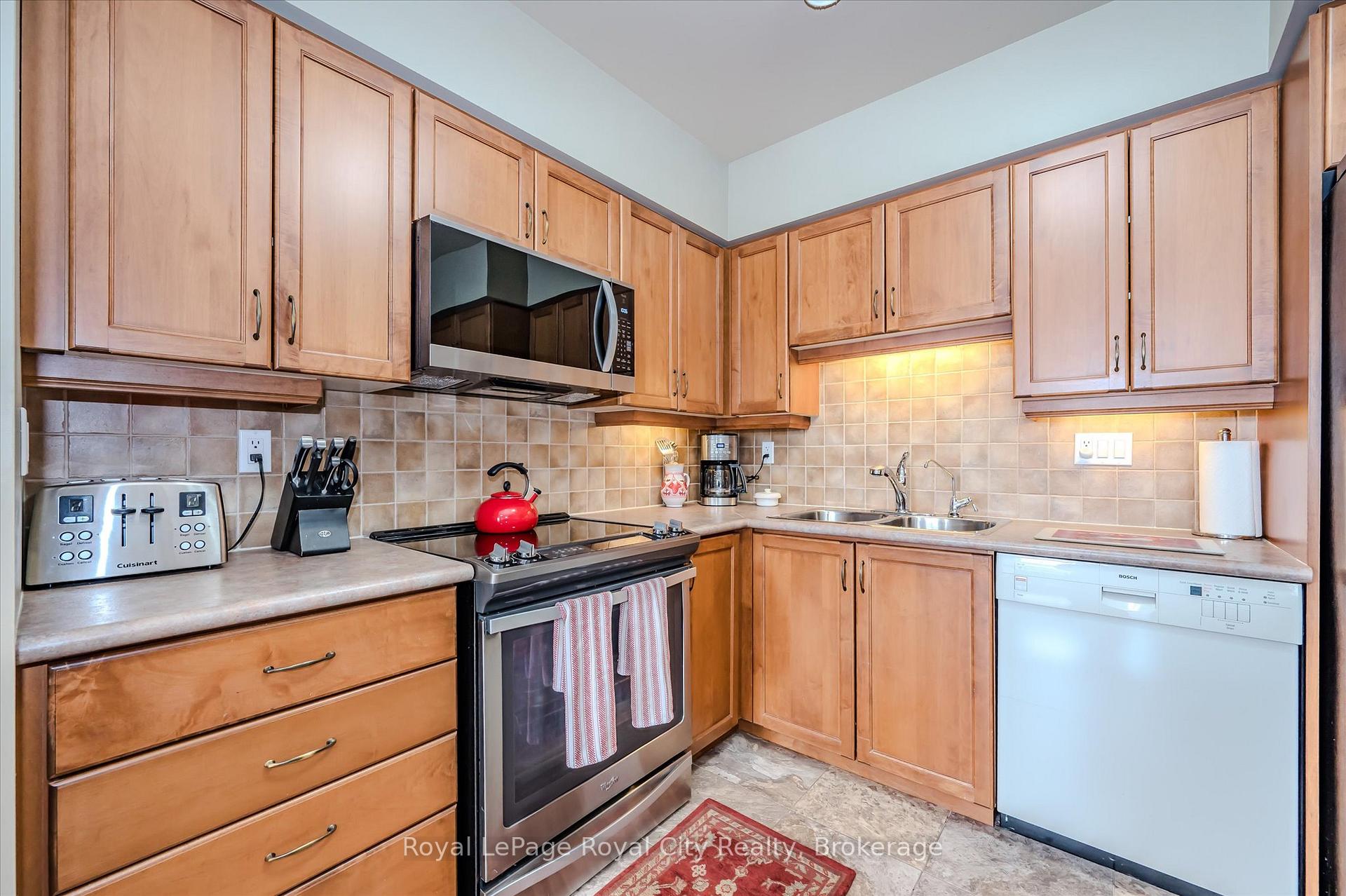 Photo 18 of Unit 401, 65 Bayberry Drive, Guelph, Village By The Arboretum — HOMEH