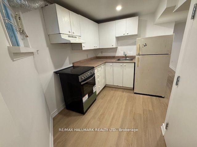 Photo 4 of Unit Lower, 57 Hiawatha Road, Toronto, Greenwood-Coxwell — HOMEH