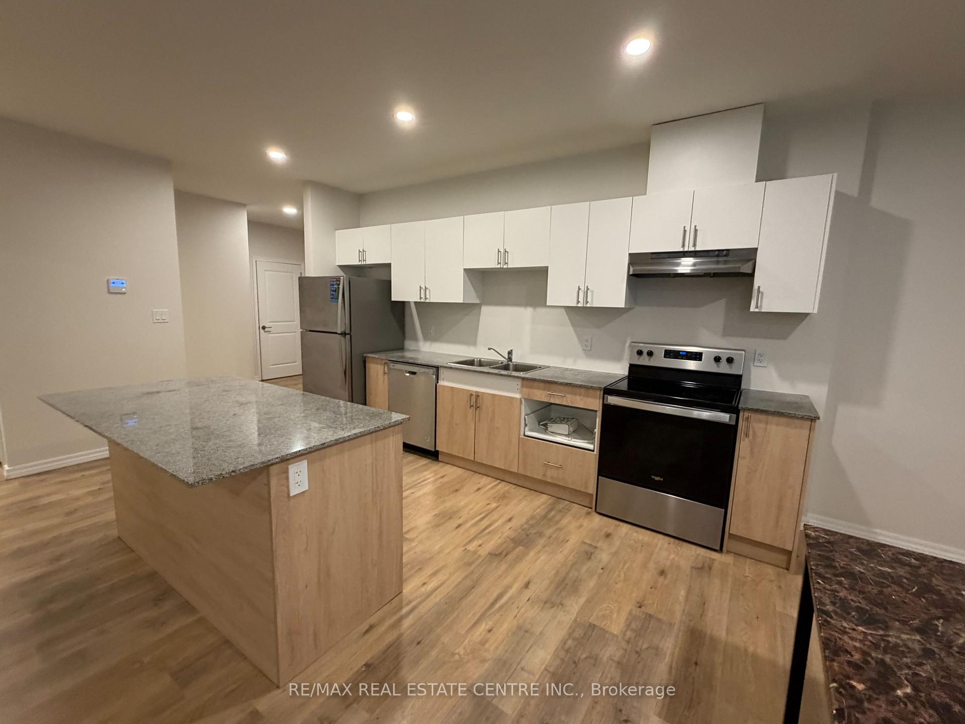 Photo 12 of Unit #105A, 1098 Paisley Road, Guelph, Willow West/Sugarbush/West Acres — HOMEH