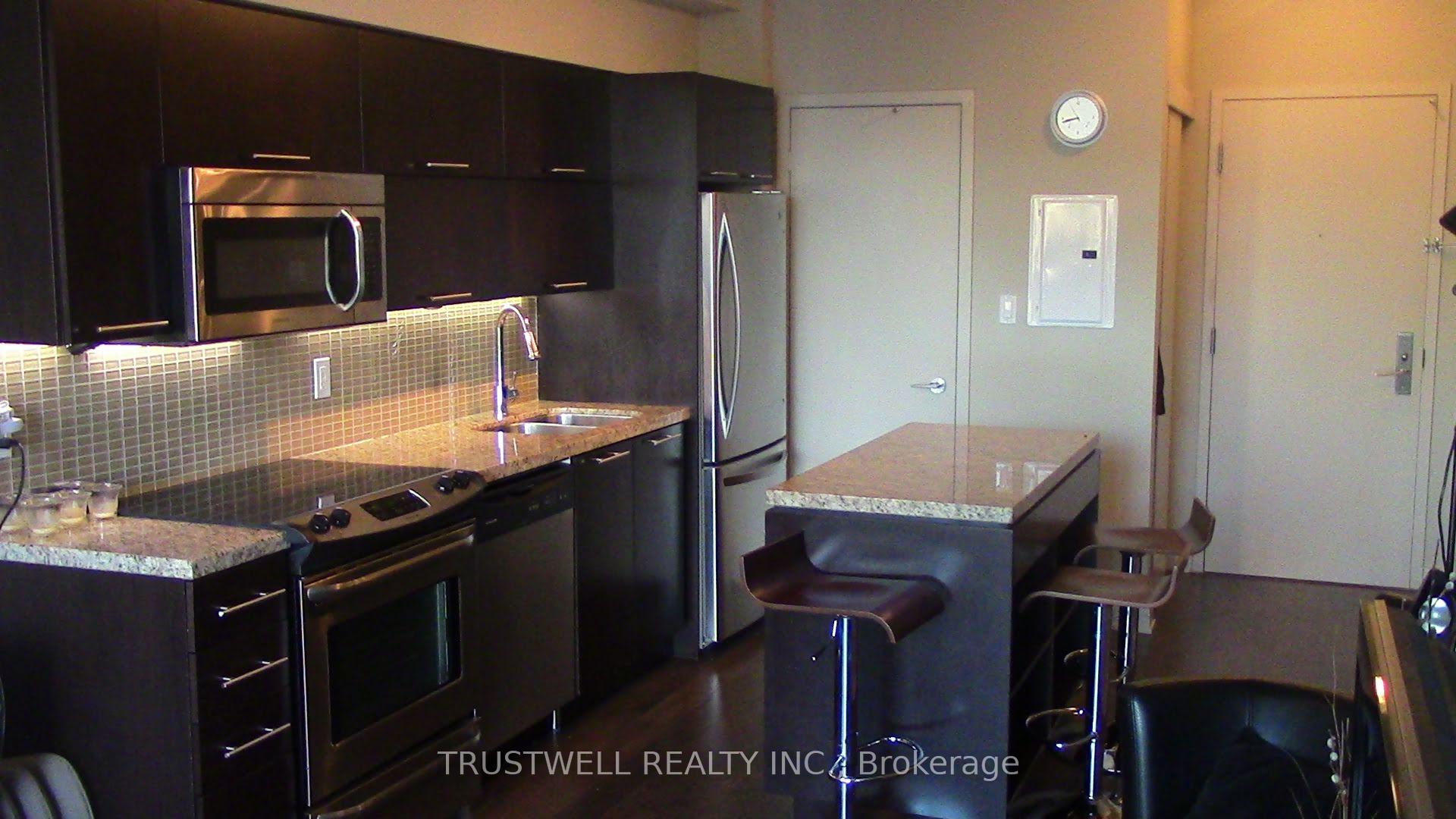 Photo 2 of Unit 2005, 126 Simcoe Street, Toronto, Waterfront Communities — HOMEH