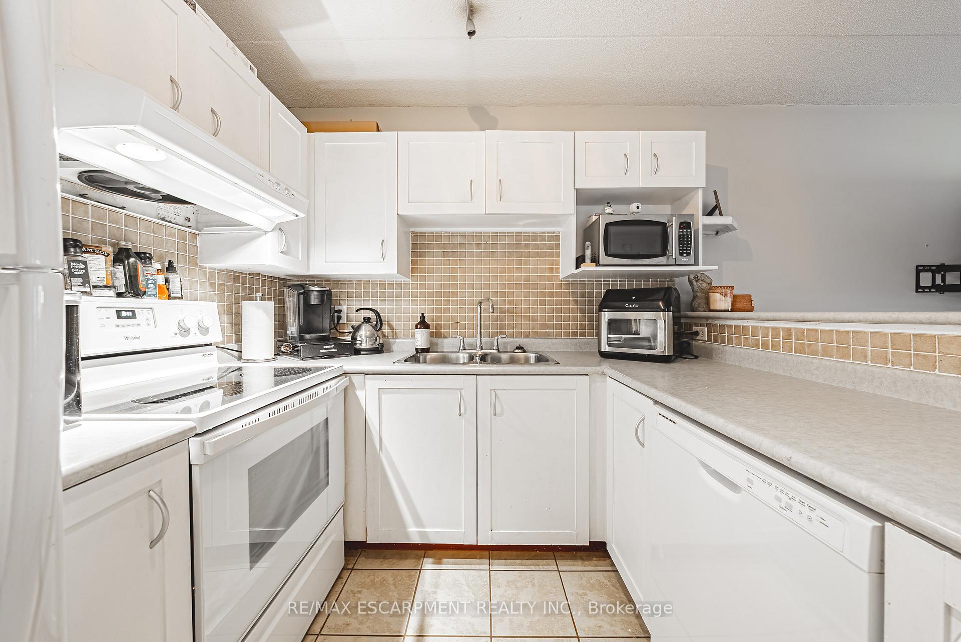 Photo 9 of Unit 313, 1451 Walkers Line, Burlington, Tansley — HOMEH