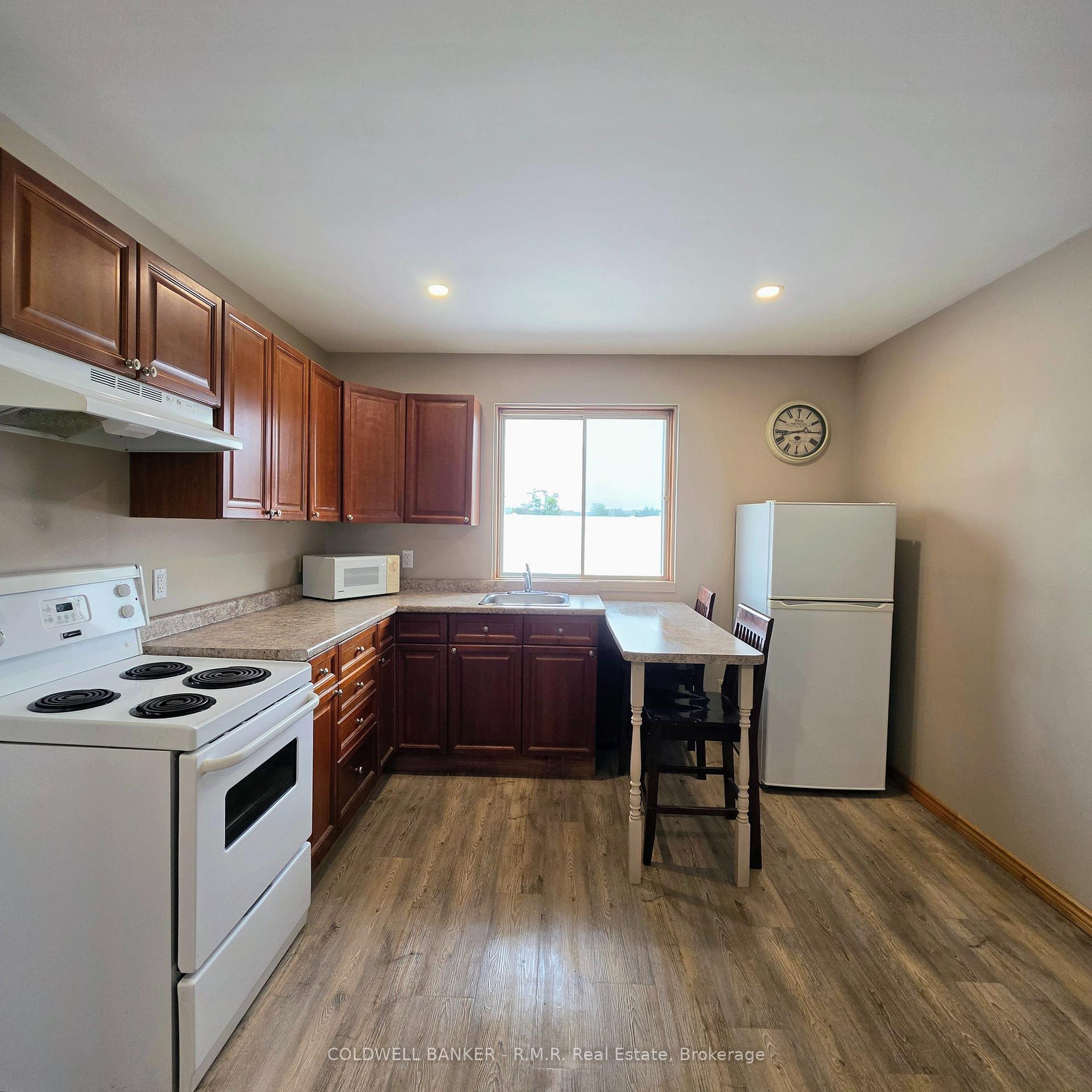Photo 11 of Unit 2, 1024 Division Street, Cobourg — HOMEH