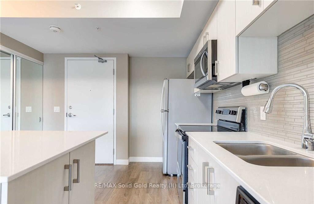 Photo 20 of Unit 401, 175 Commonwealth Street, Kitchener, Larentian West — HOMEH