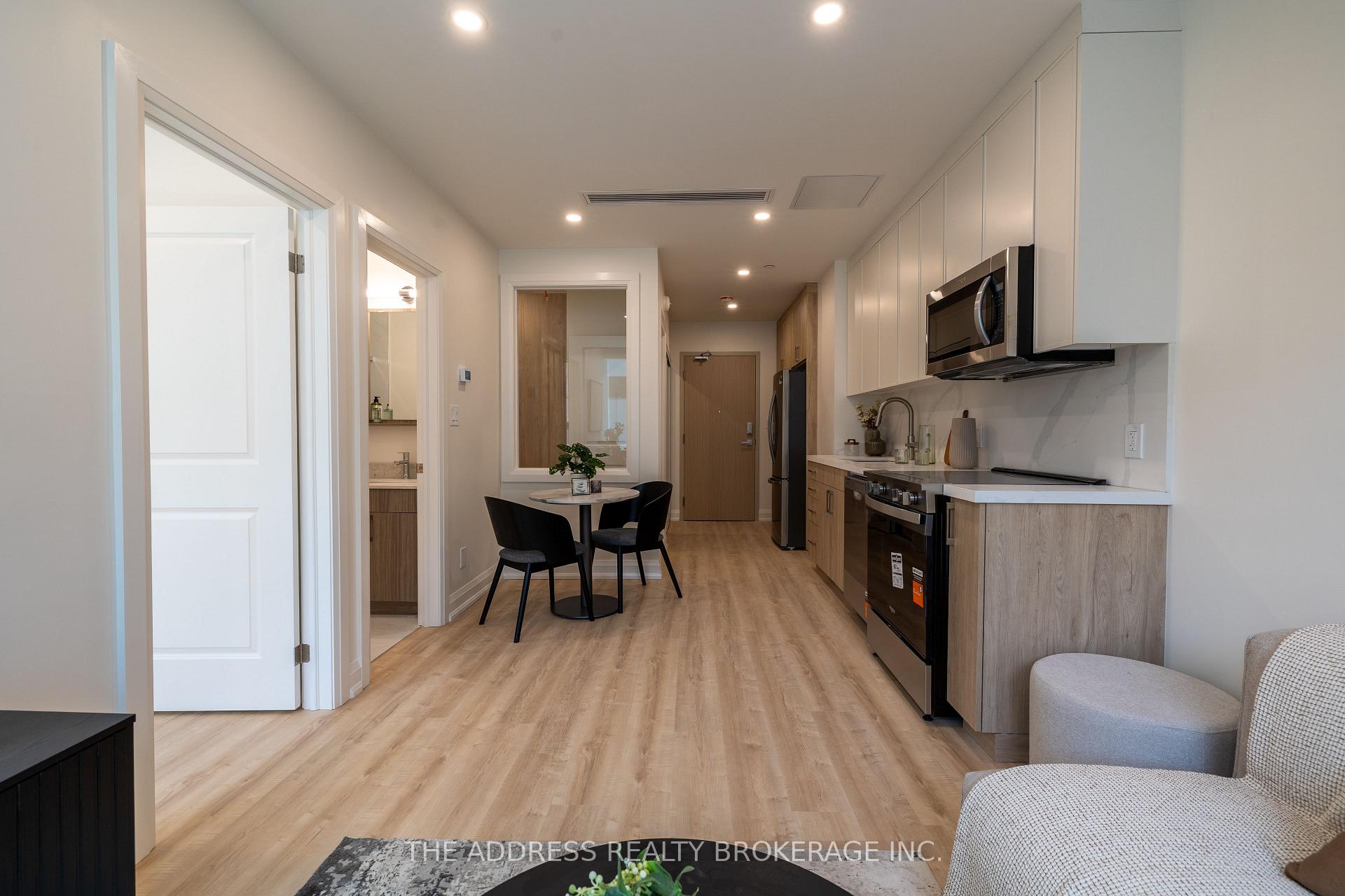 Photo 11 of Unit 409, 40 King Street W, Oshawa, Central — HOMEH