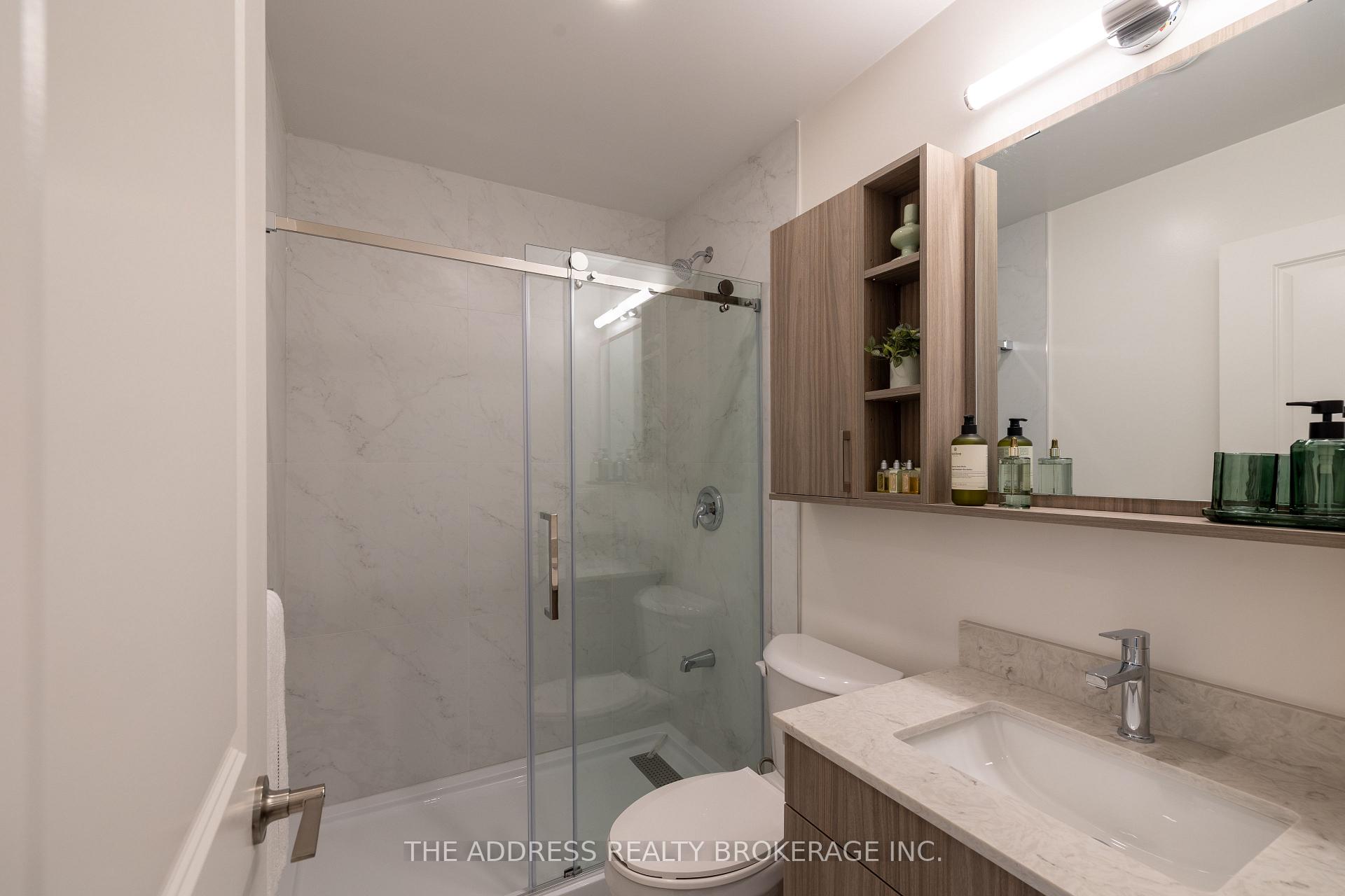 Photo 16 of Unit 409, 40 King Street W, Oshawa, Central — HOMEH