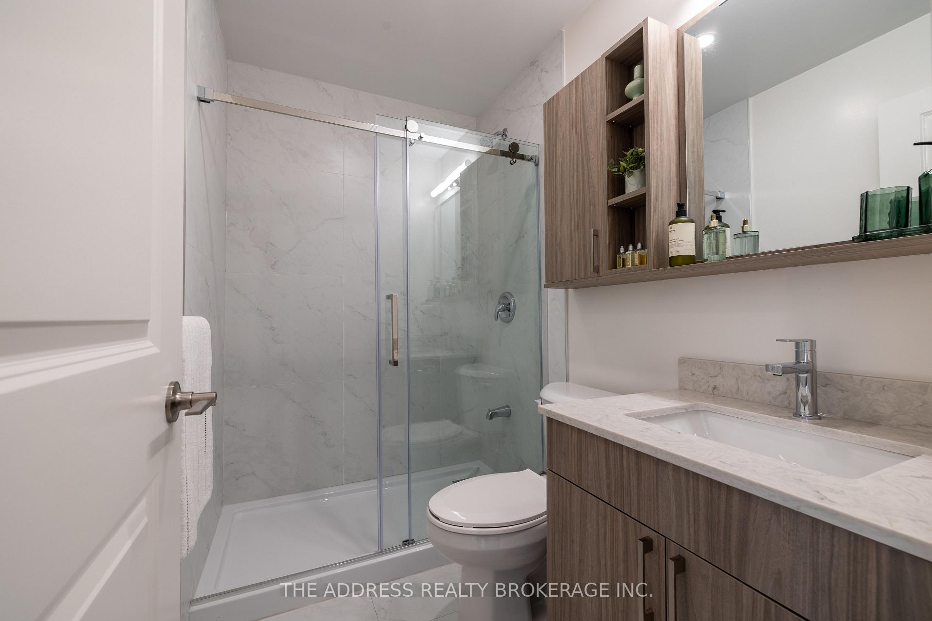 Photo 17 of Unit 409, 40 King Street W, Oshawa, Central — HOMEH