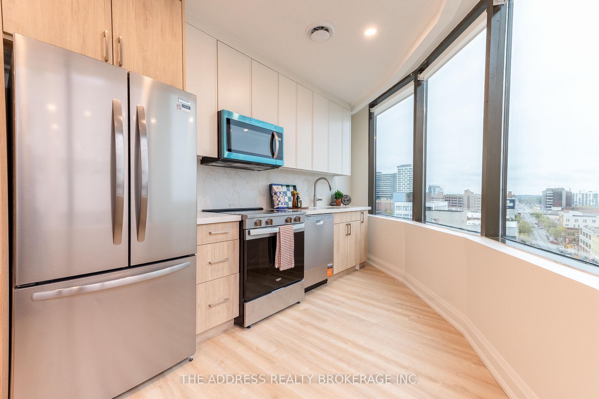 Photo 11 of Unit 710, 40 King Street W, Oshawa, Central — HOMEH