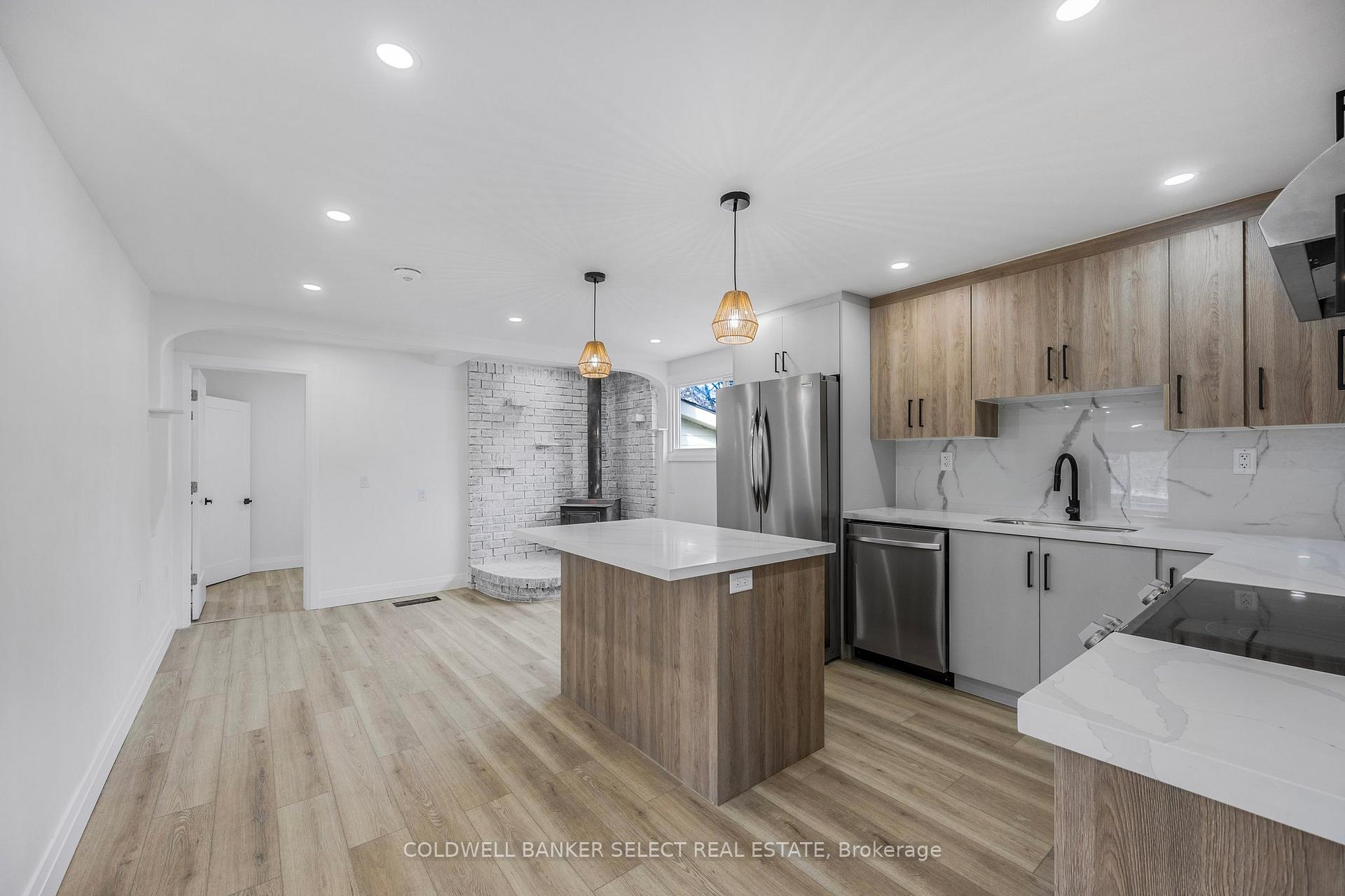 Photo 3 of Unit Unit 2, 338 Old Mosley Street, Wasaga Beach — HOMEH