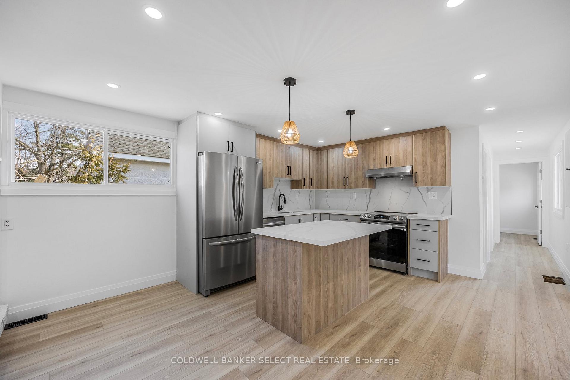 Photo 4 of Unit Unit 2, 338 Old Mosley Street, Wasaga Beach — HOMEH