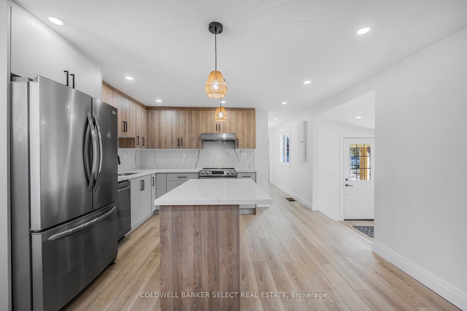 Photo 5 of Unit Unit 2, 338 Old Mosley Street, Wasaga Beach — HOMEH