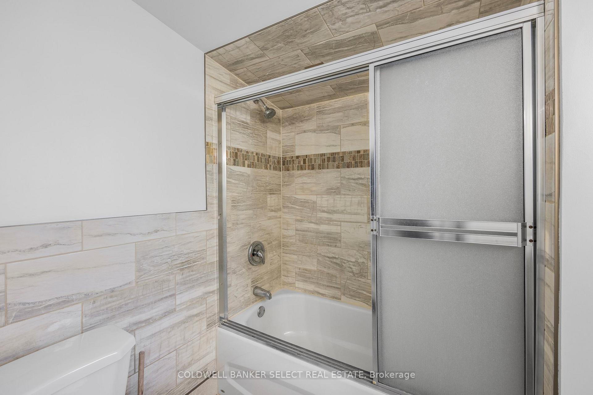 Photo 11 of Unit Unit 2, 338 Old Mosley Street, Wasaga Beach — HOMEH