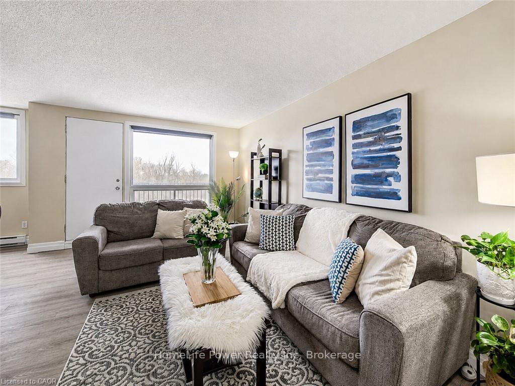 Photo 2 of Unit 303, 4 Avalon Place, Kitchener, Meinzinger — HOMEH