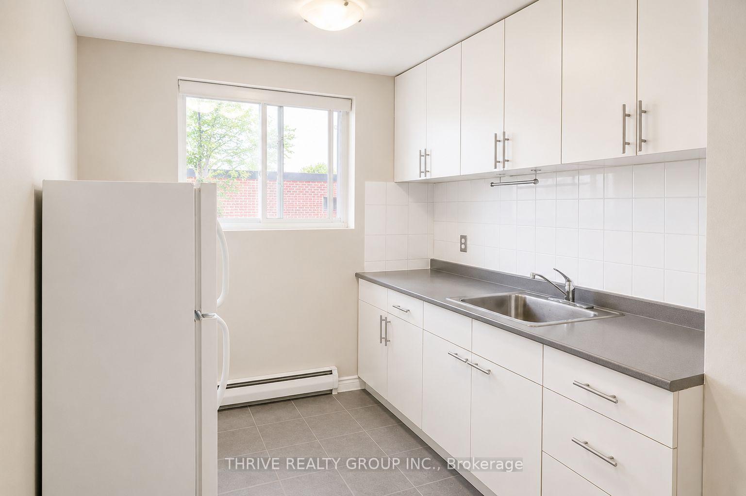 Photo 5 of Unit 3, 153 Godfrey Drive E, London, East D — HOMEH