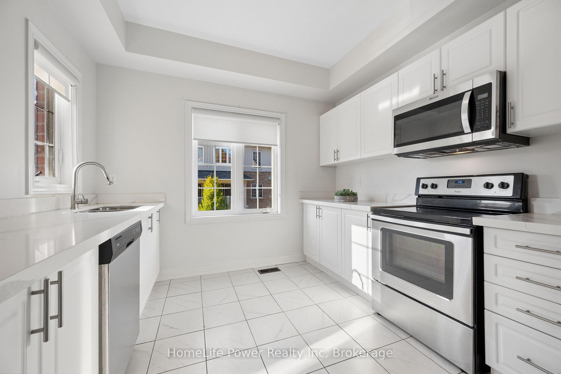 Photo 10 of Unit 57, 88 Decorso Drive, Guelph, Kortright East — HOMEH