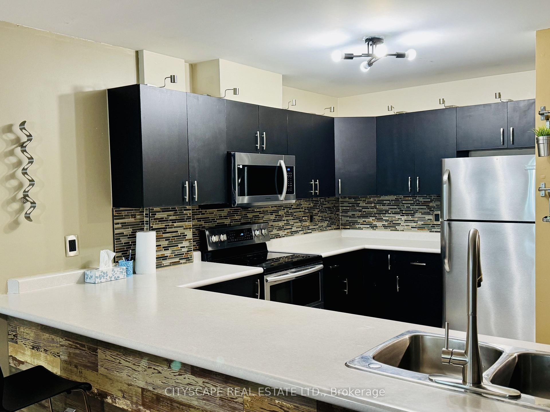 Photo 11 of Unit 5F, 540 Ouellette Avenue, Windsor — HOMEH
