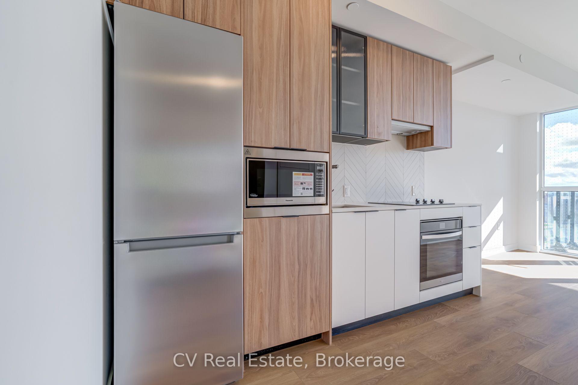 Photo 5 of Unit 407, 1037 The Queensway, Etobicoke, Islington-City Centre West — HOMEH