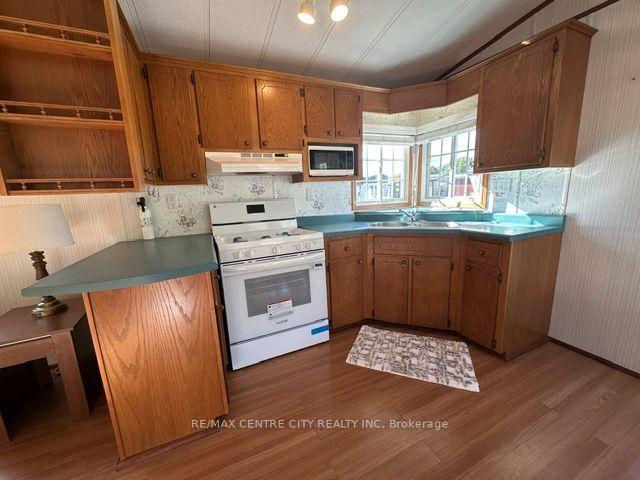Photo 5 of Unit 111, 2189 Dundas Street E, London, East I — HOMEH