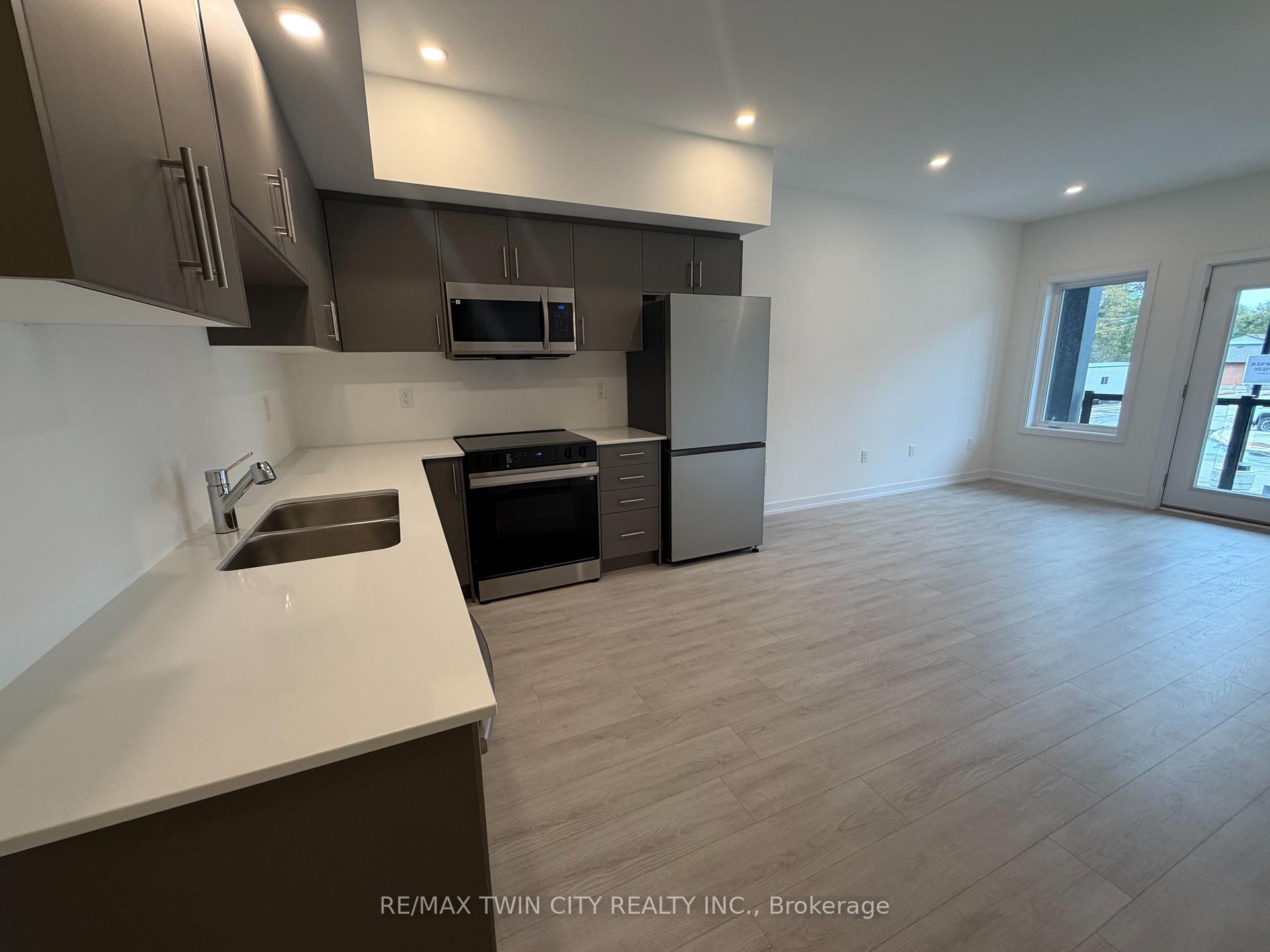 Photo 5 of Unit 80, 42 Lowes Road W, Guelph, Clairfields/Hanlon Business Park — HOMEH