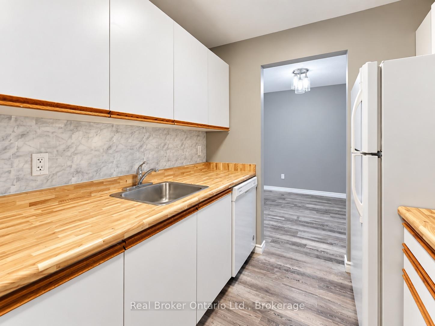 Photo 9 of Unit 101, 725 Deveron Crescent, London, South T — HOMEH
