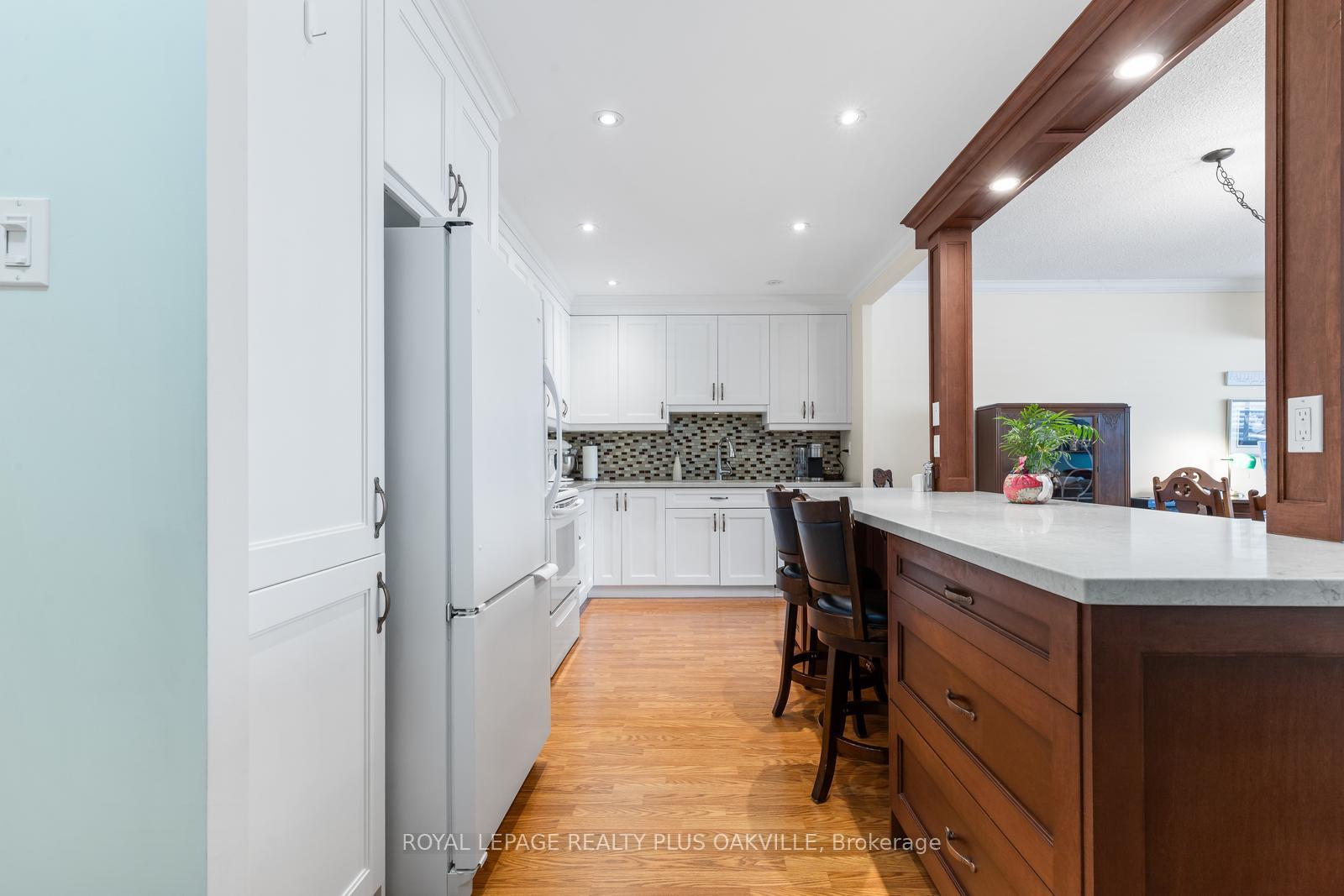 Photo 5 of Unit 102, 2175 Marine Drive, Oakville, Bronte — HOMEH