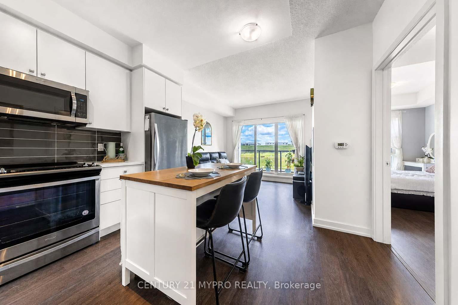 Photo 4 of Unit 320, 555 William Graham Drive, Aurora, Rural Aurora — HOMEH