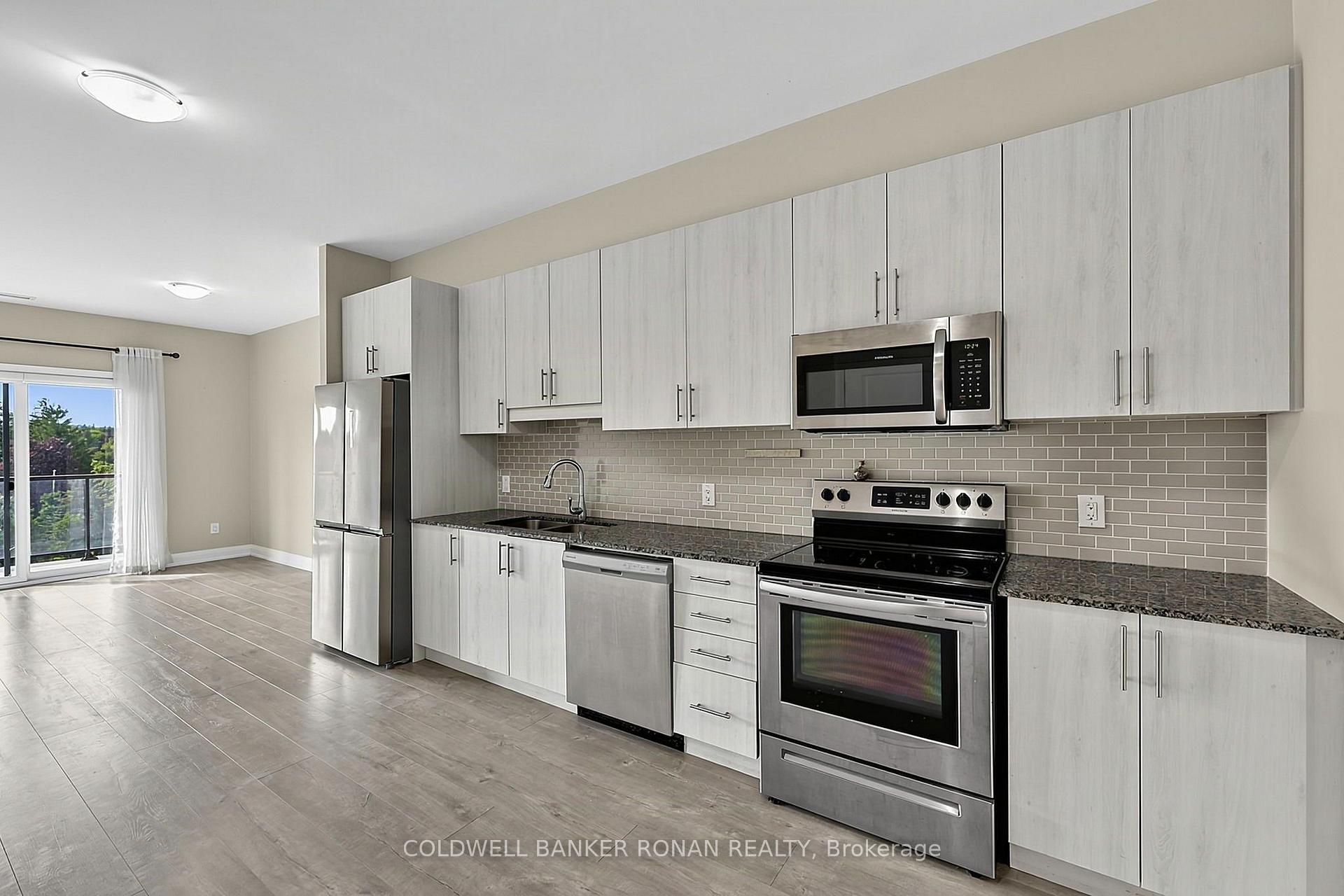 Photo 5 of Unit 502, 64 Queen Street S, New Tecumseth, Tottenham — HOMEH