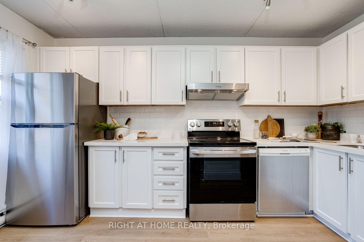 Photo 4 of Unit 207, 580 Mary Street E, Whitby, Downtown Whitby — HOMEH