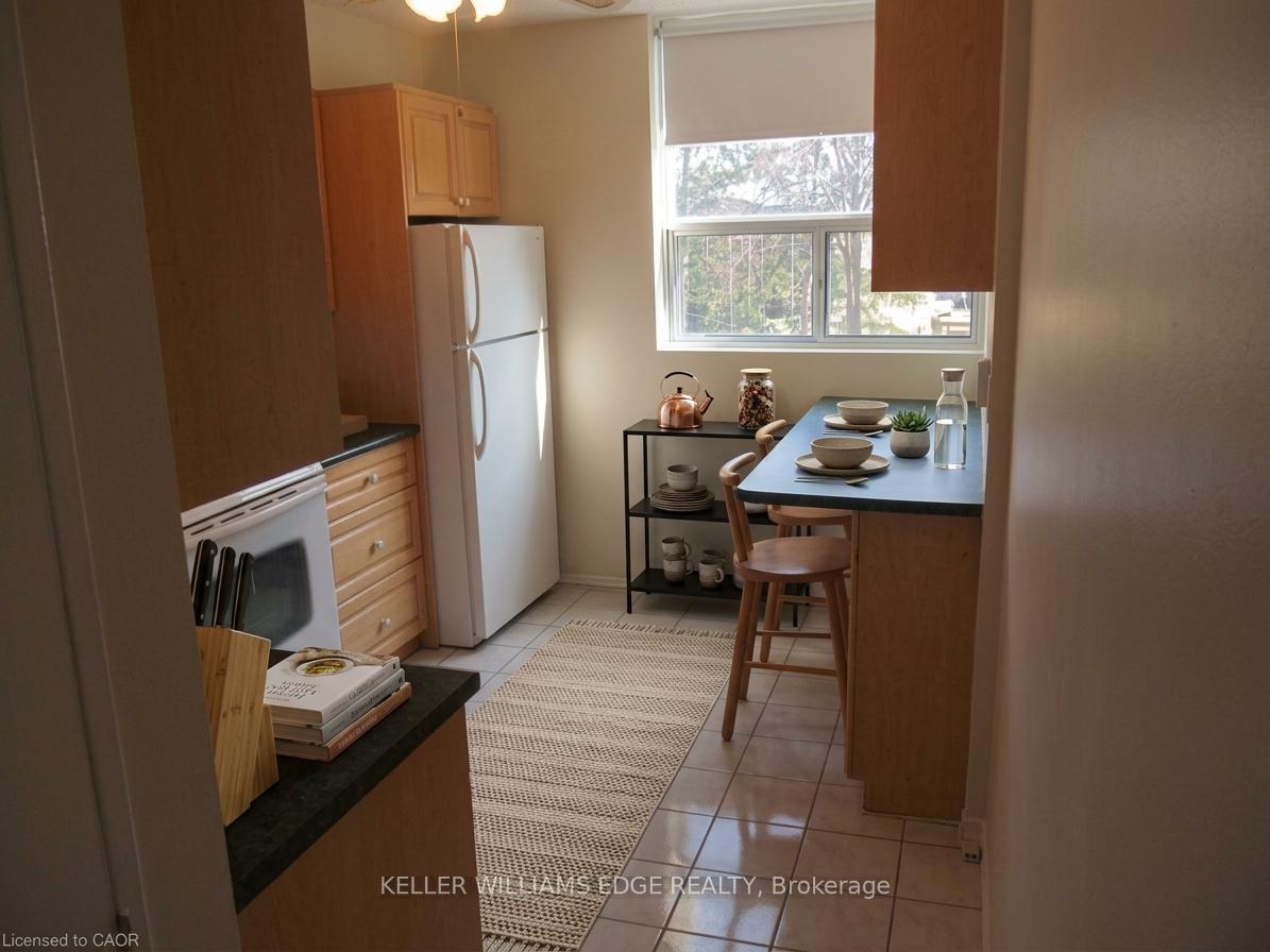 Photo 5 of Unit 209, 700 Dynes Road, Burlington, Roseland — HOMEH