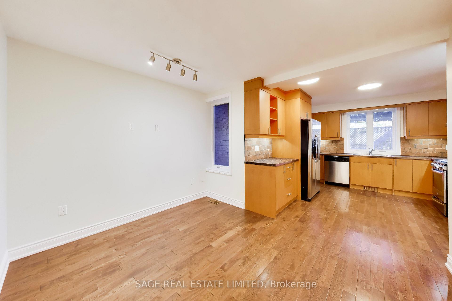 Photo 6 of Unit Main, 32 Castleton Avenue, Toronto, Rockcliffe-Smythe — HOMEH
