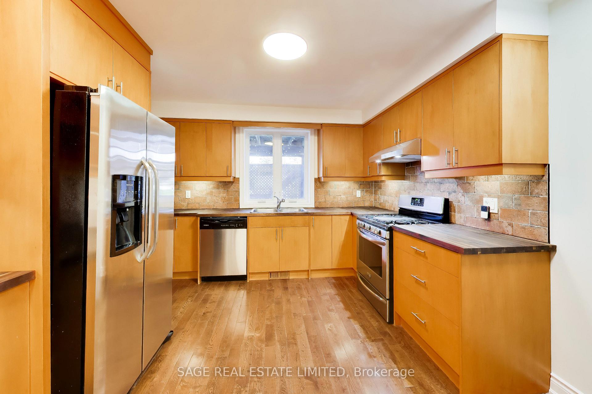 Photo 9 of Unit Main, 32 Castleton Avenue, Toronto, Rockcliffe-Smythe — HOMEH
