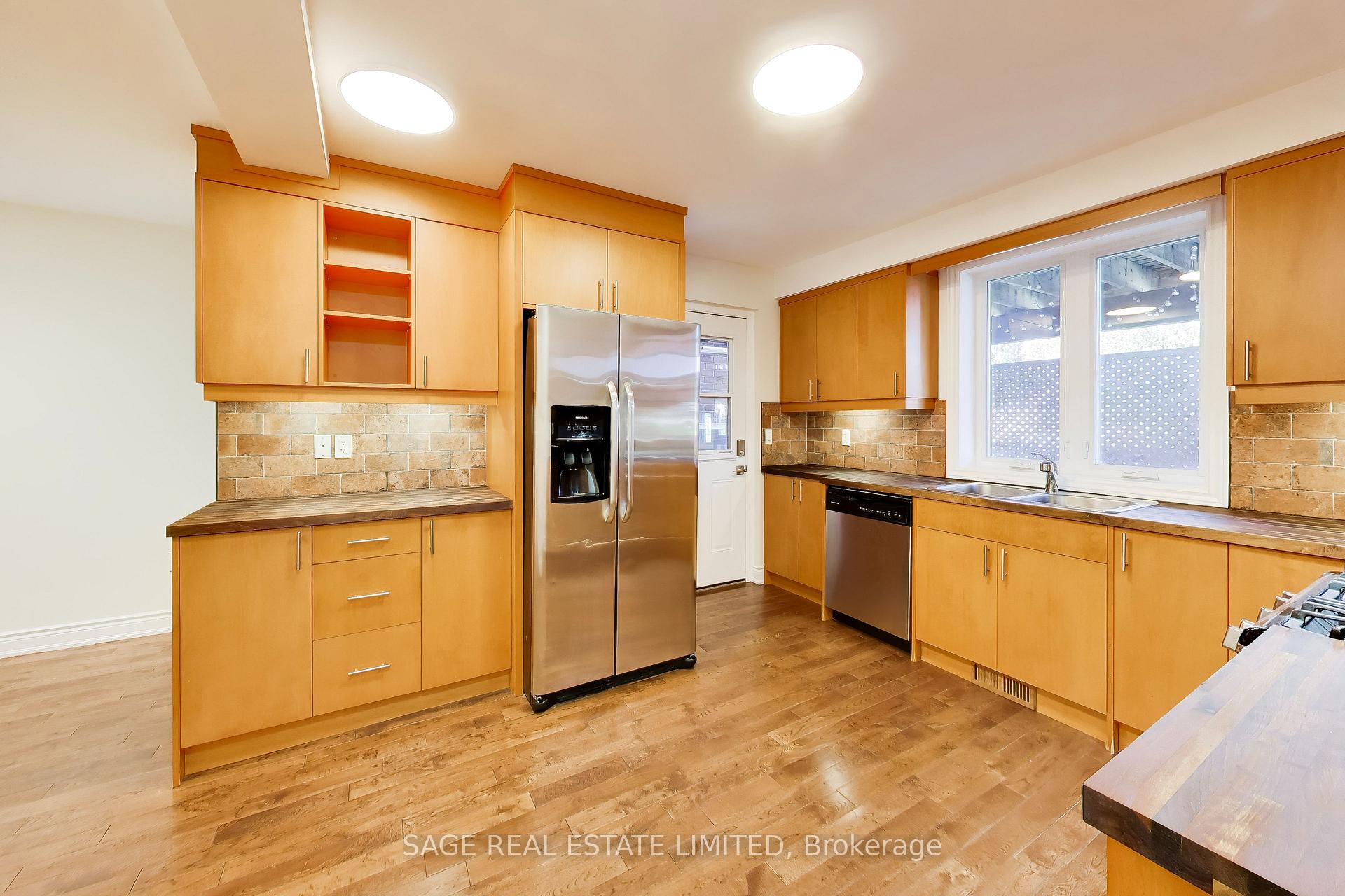 Photo 10 of Unit Main, 32 Castleton Avenue, Toronto, Rockcliffe-Smythe — HOMEH