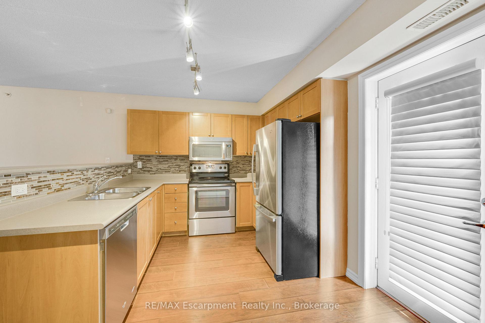 Photo 10 of Unit 102, 2075 Appleby Line, Burlington, Uptown — HOMEH