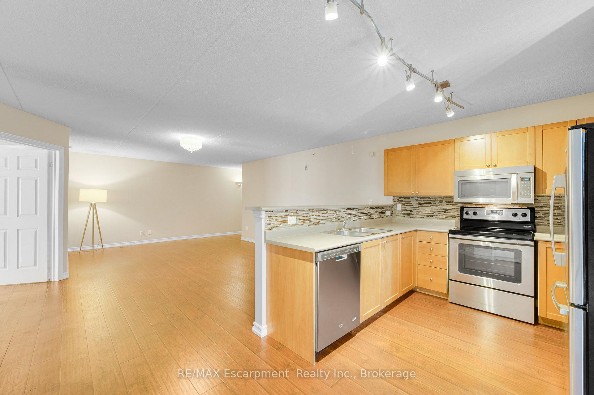 Photo 11 of Unit 102, 2075 Appleby Line, Burlington, Uptown — HOMEH