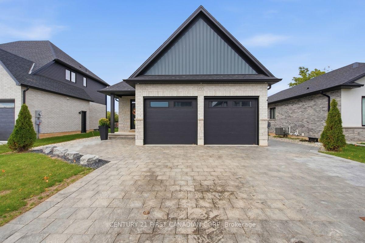 Photo 2 of 12 Briscoe Crescent, Strathroy-Caradoc, NE — HOMEH
