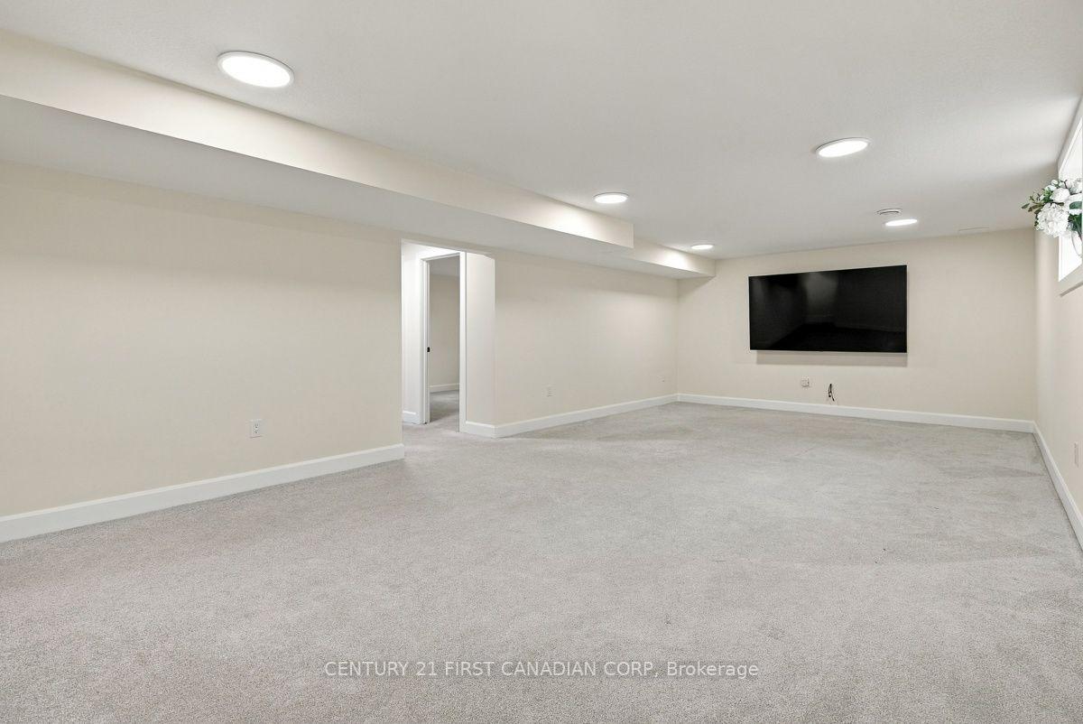 Photo 32 of 12 Briscoe Crescent, Strathroy-Caradoc, NE — HOMEH